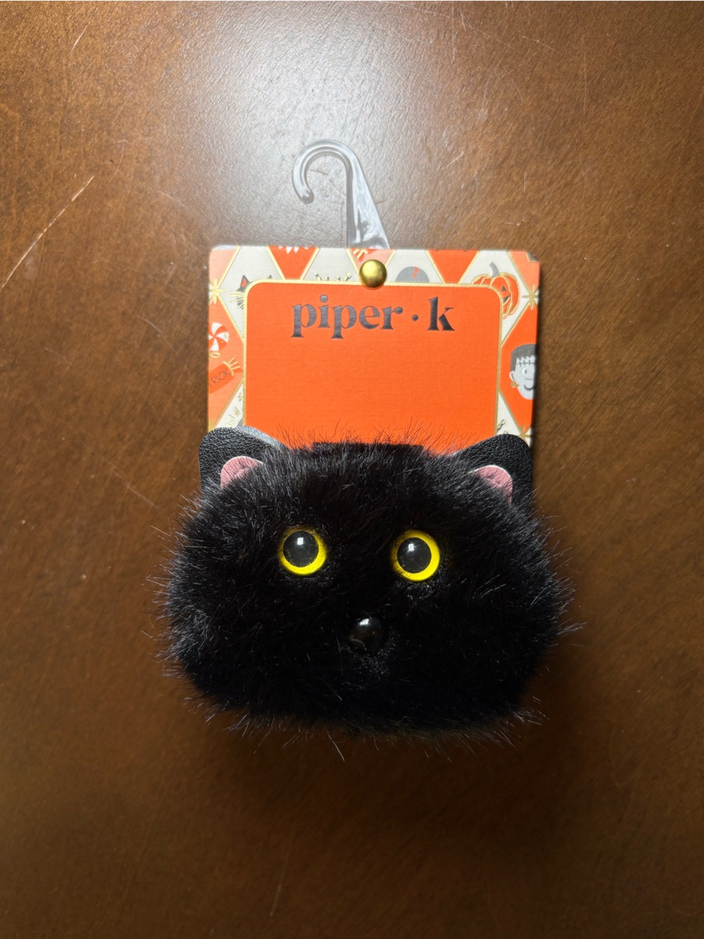 Piper Black Plush Cat Face Toy with Yellow Eyes